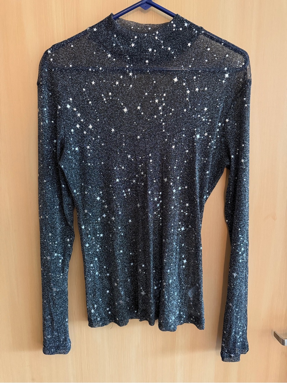 Black Star-Print Long Sleeve Mock Neck Top